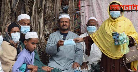 করোনার দ্বিতীয় ধাক্কা সামলাতে জনসচেতনতা মূলক প্রচার ও মাক্স বিতরণ