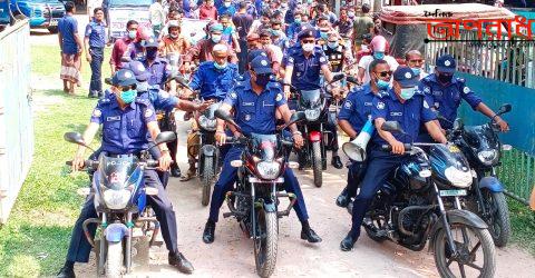 পিরোজপুরের  কোভিড-১৯ মোকাবেলায় পুলিশের মাক্স ব্যবহারে সচেতনতা র‍্যালি